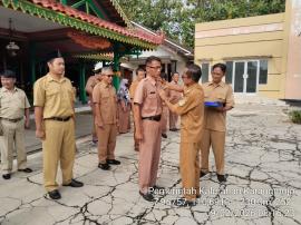 KEGIATAN APEL PAGI DAN PEMASANGAN NAMETAGE KALURAHAN KARANGMOJO SENIN 09 FEBRUARI 2026